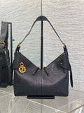 Dior quilted hobo bag with gold-tone hardware and shoulder straps, dark