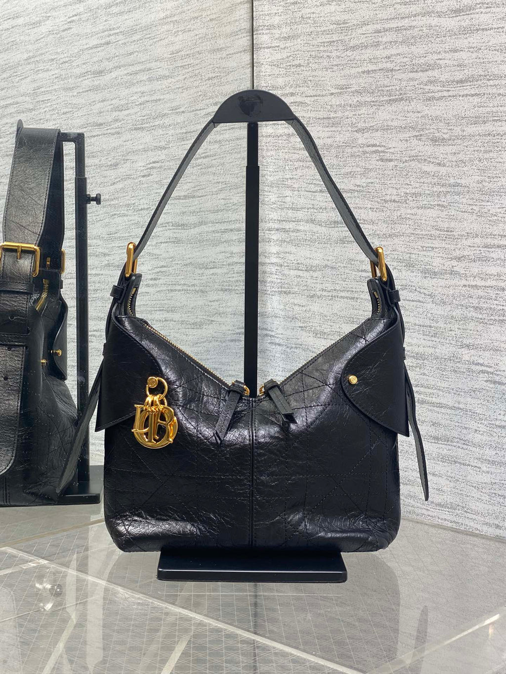 Dior black leather shoulder hobo bag with gold hardware and top handles