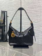 Dior black leather shoulder hobo bag with gold hardware and top handles