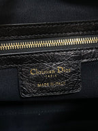 Christian Dior Paris leather label with gold zipper and Made in Italy text