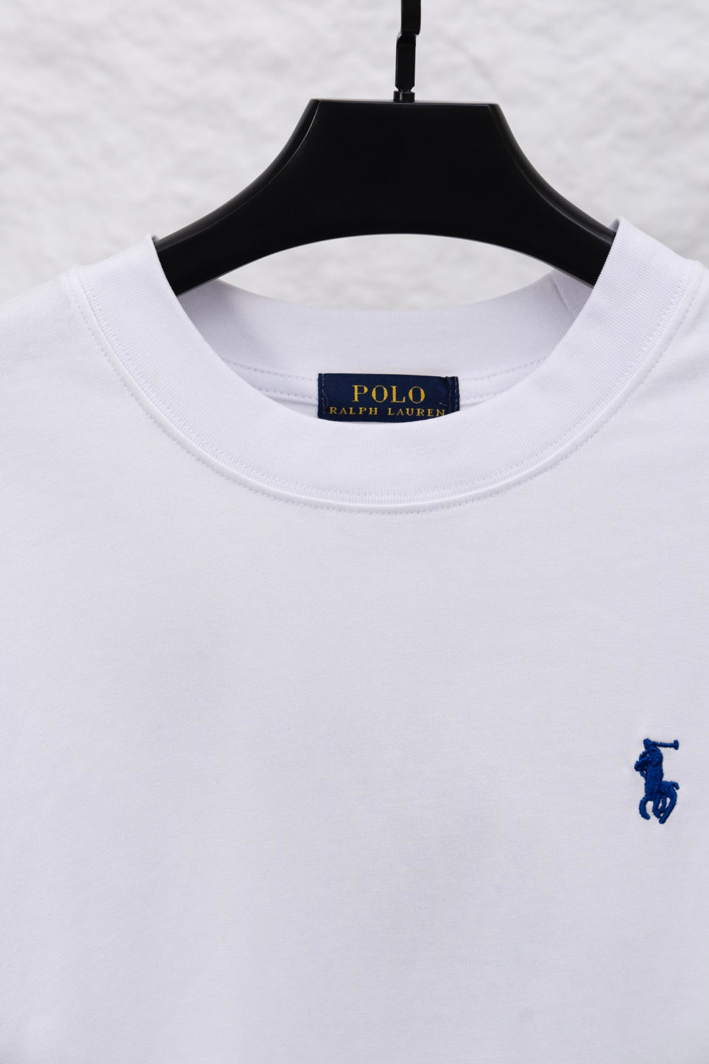 White long-sleeve T-shirt neckline with POLO Ralph Lauren label and logo