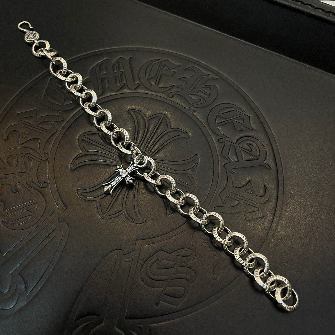 Silver-tone chain bracelet with round links and cross pendant charm