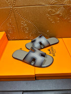 Hermes slide sandals, light blue upper with cutout front and cushioned footbed