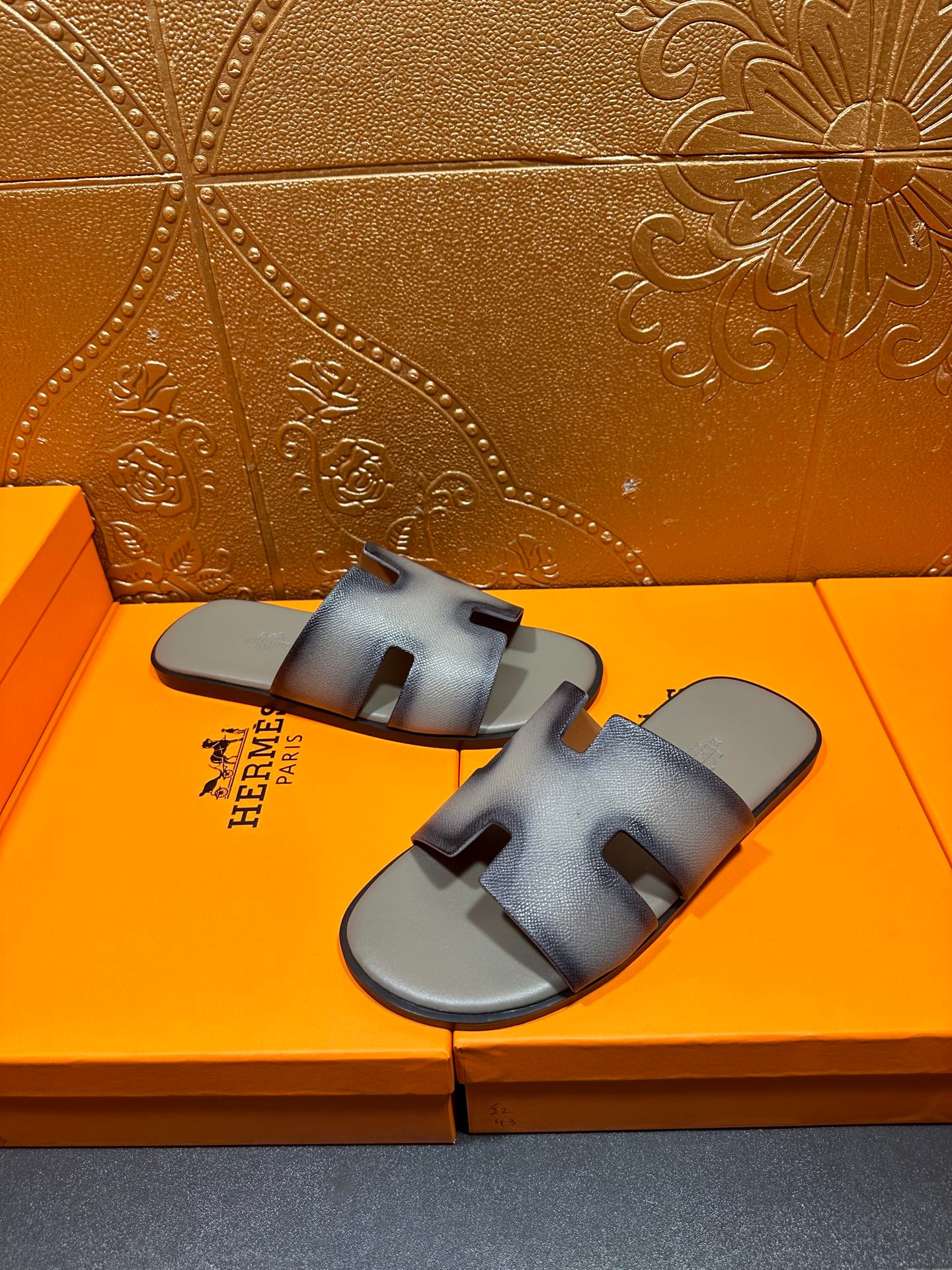 Hermes slide sandals, light blue leather with sculpted toe opening and strap detail