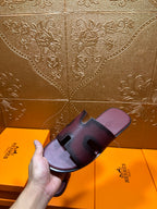 Slide sandals on footbed, dark purple straps with H buckle and open heel