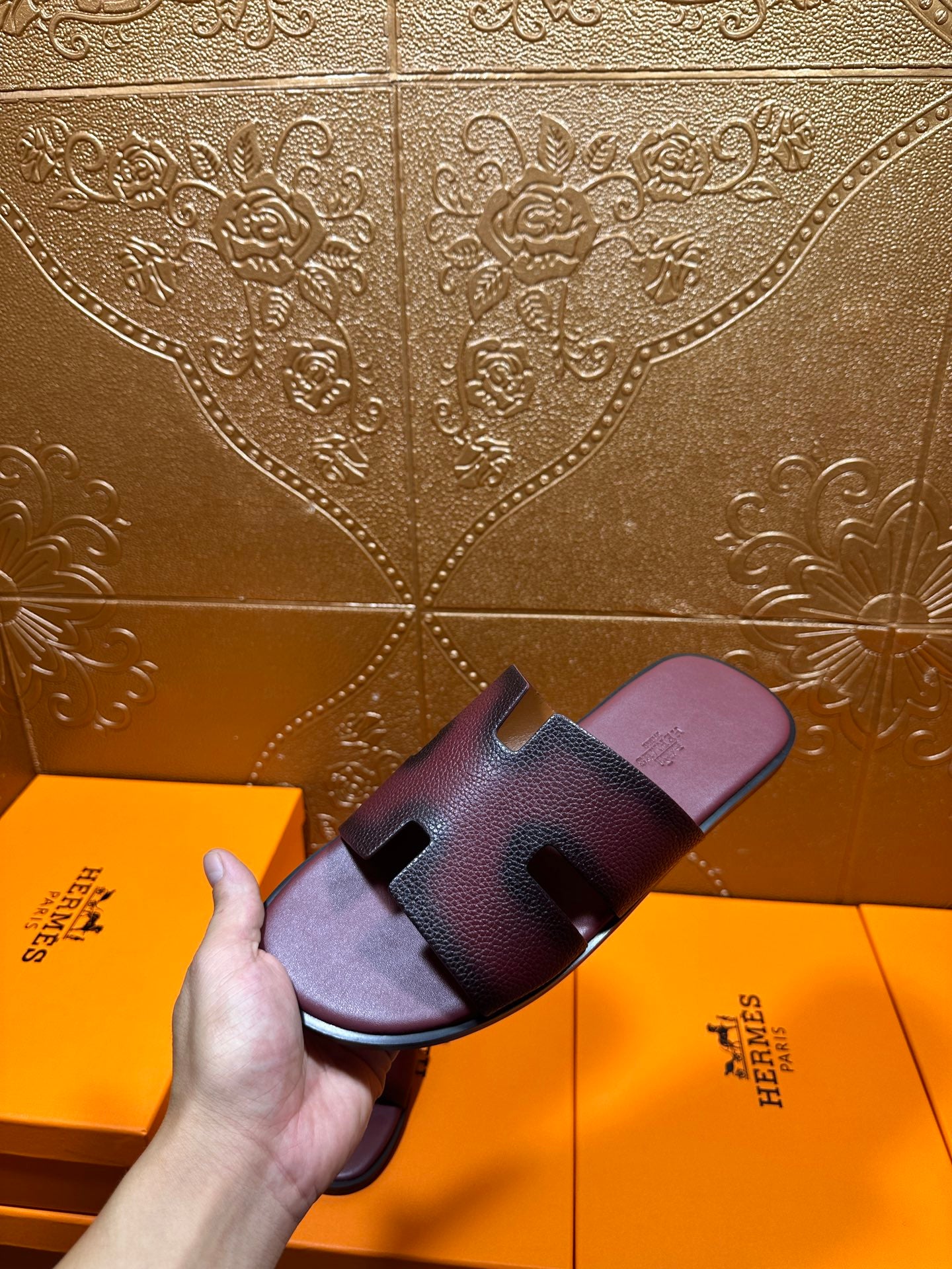 Slide sandals on footbed, dark purple straps with H buckle and open heel