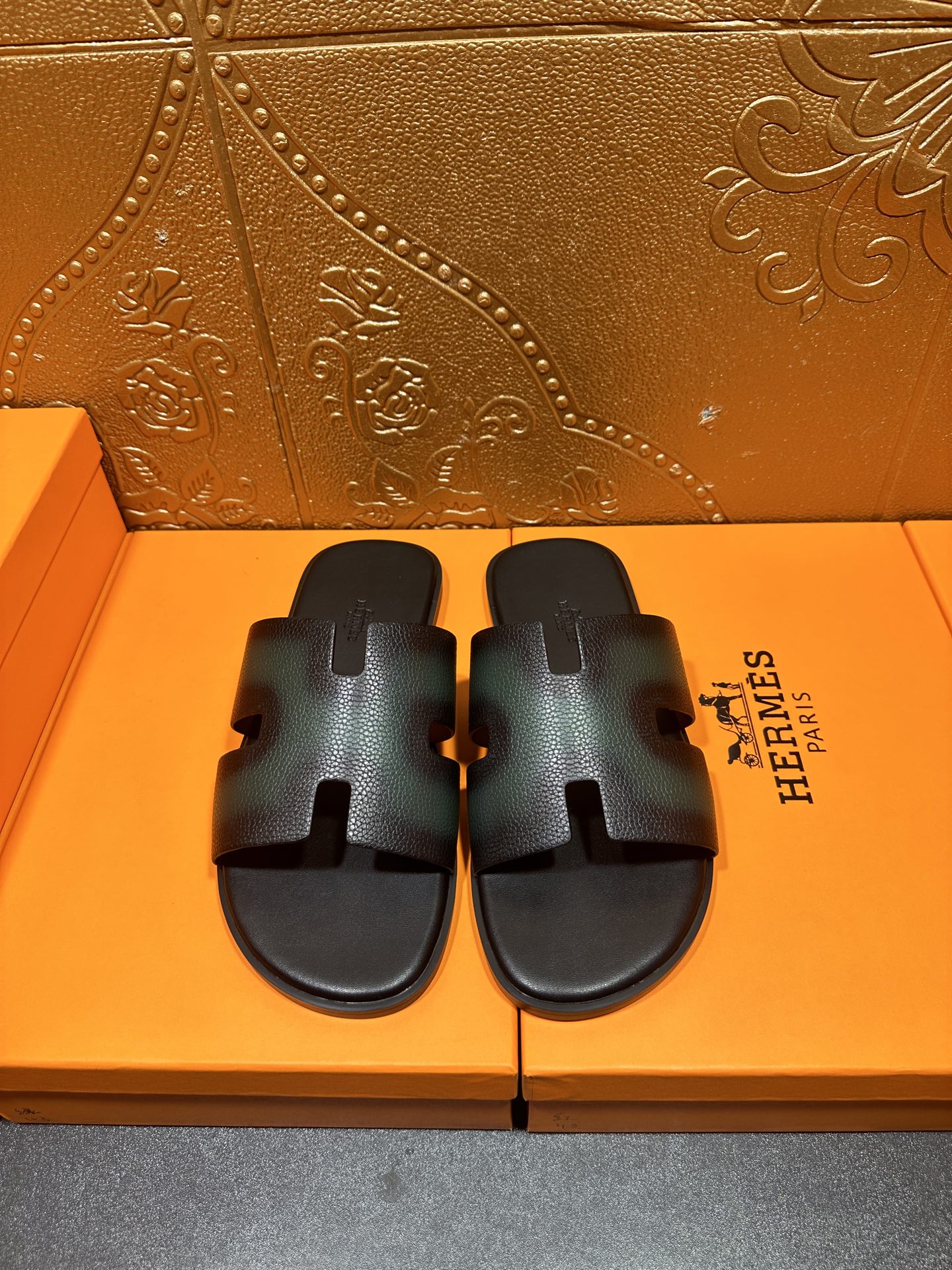 Hermes slide sandals with dark teal leather straps and an open toe