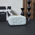 Chanel quilted belt bag, light blue with embossed CC logo and gold chain.