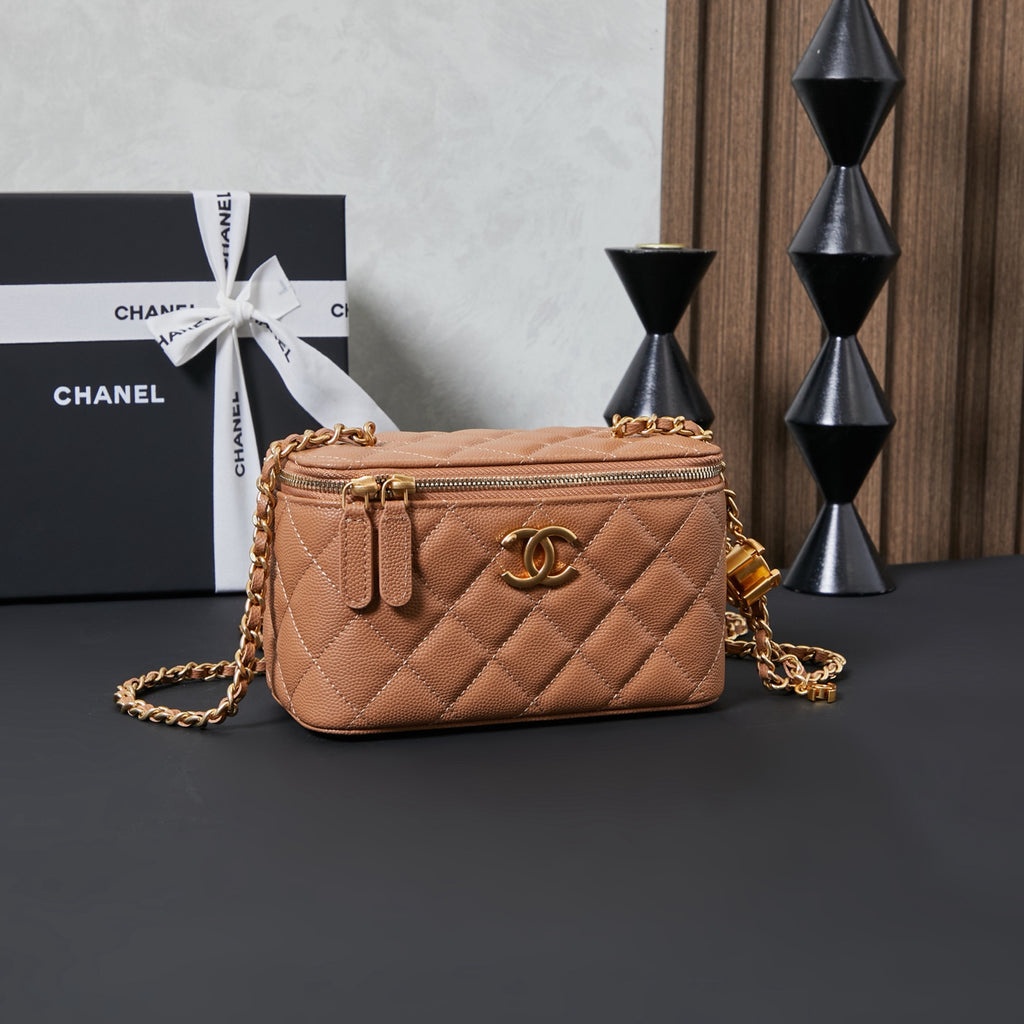 Quilted Chanel mini shoulder bag with gold chain strap, tan leather-look finish
