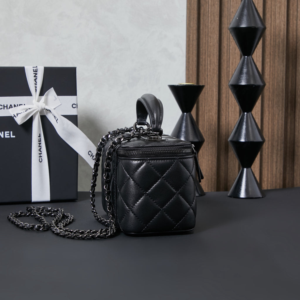Chanel quilted leather mini bag with chain strap, front zipper pocket, black