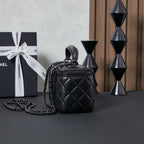 Chanel quilted leather mini bag with chain strap, front zipper pocket, black