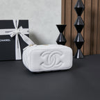 White quilted Chanel mini bag back with embossed CC logo