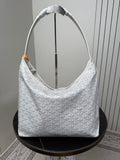 Goyard white hobo bag with woven top handles and textured monogram pattern.