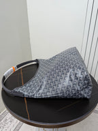 Goyard patterned hobo bag, blue-gray canvas with orange accent and top handles