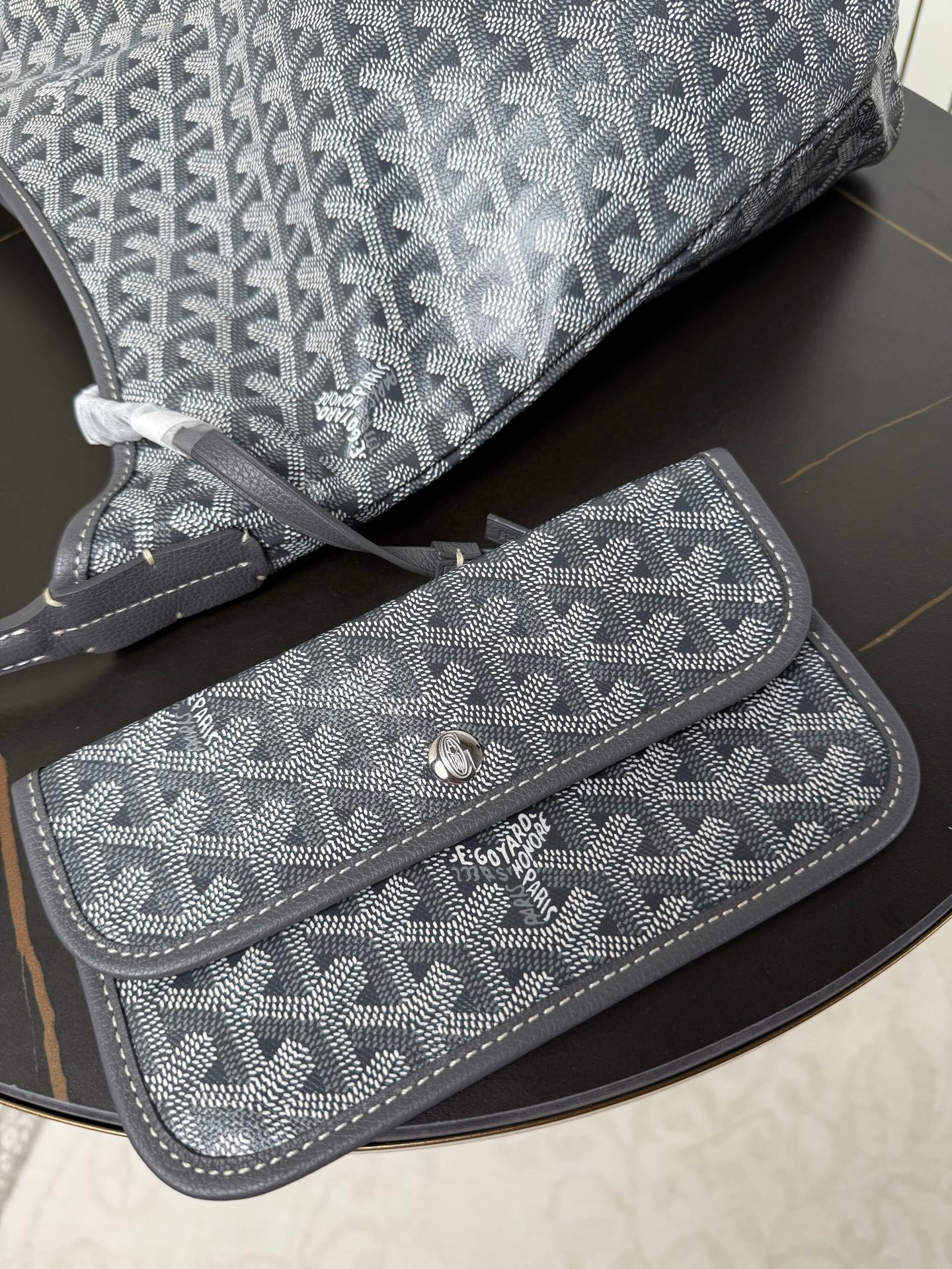 Goyard patterned pouch and hobo bag set, blue-gray canvas with snap closure