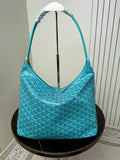 Goyard teal monogram hobo bag with top handles and open interior