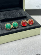 Van Cleef & Arpels earrings, gold-tone studs with green and red round stones