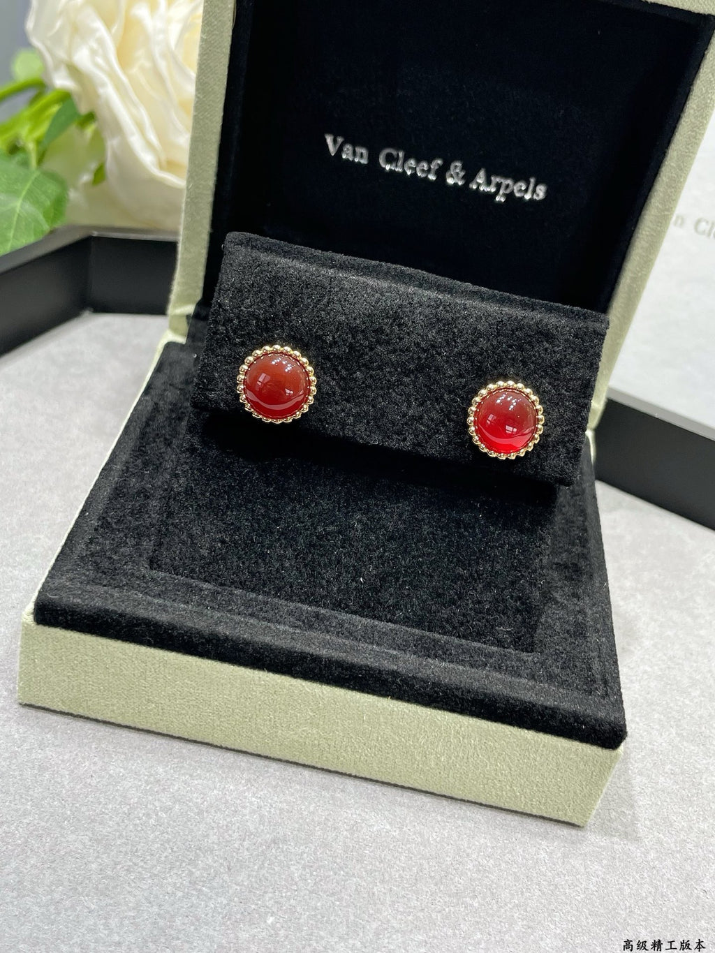 Van Cleef & Arpels earrings set, gold-tone studs with red round stones in box