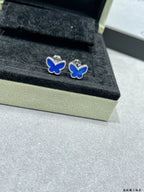 Butterfly stud earrings with blue enamel and small clear stones