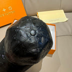 Louis Vuitton monogram cap, black embossed leather with domed crown and button