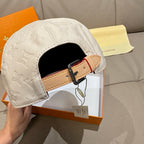 Louis Vuitton white monogram cap with adjustable tan strap and buckle