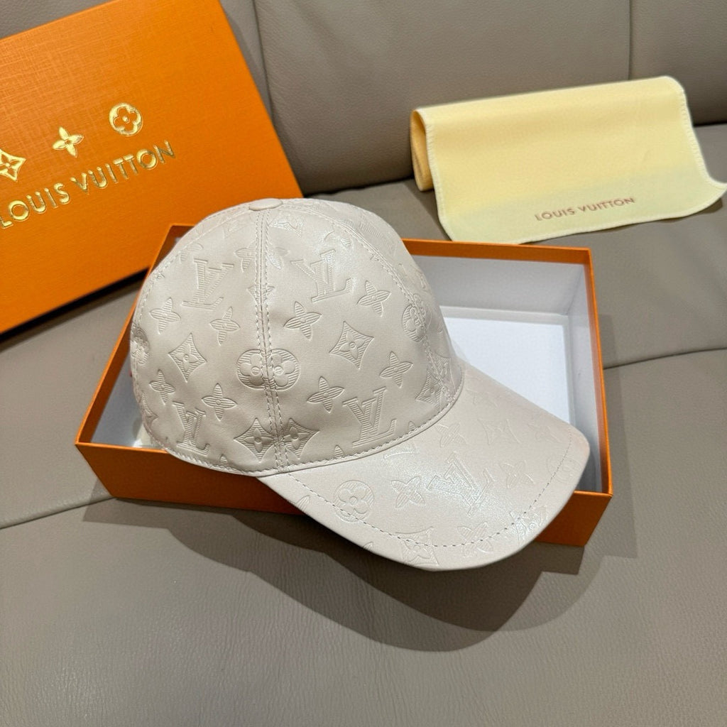 Louis Vuitton white embossed monogram baseball cap, angled front view