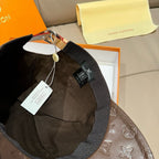 Louis Vuitton cap in dark monogram texture, black curved brim with adjustable strap and tags