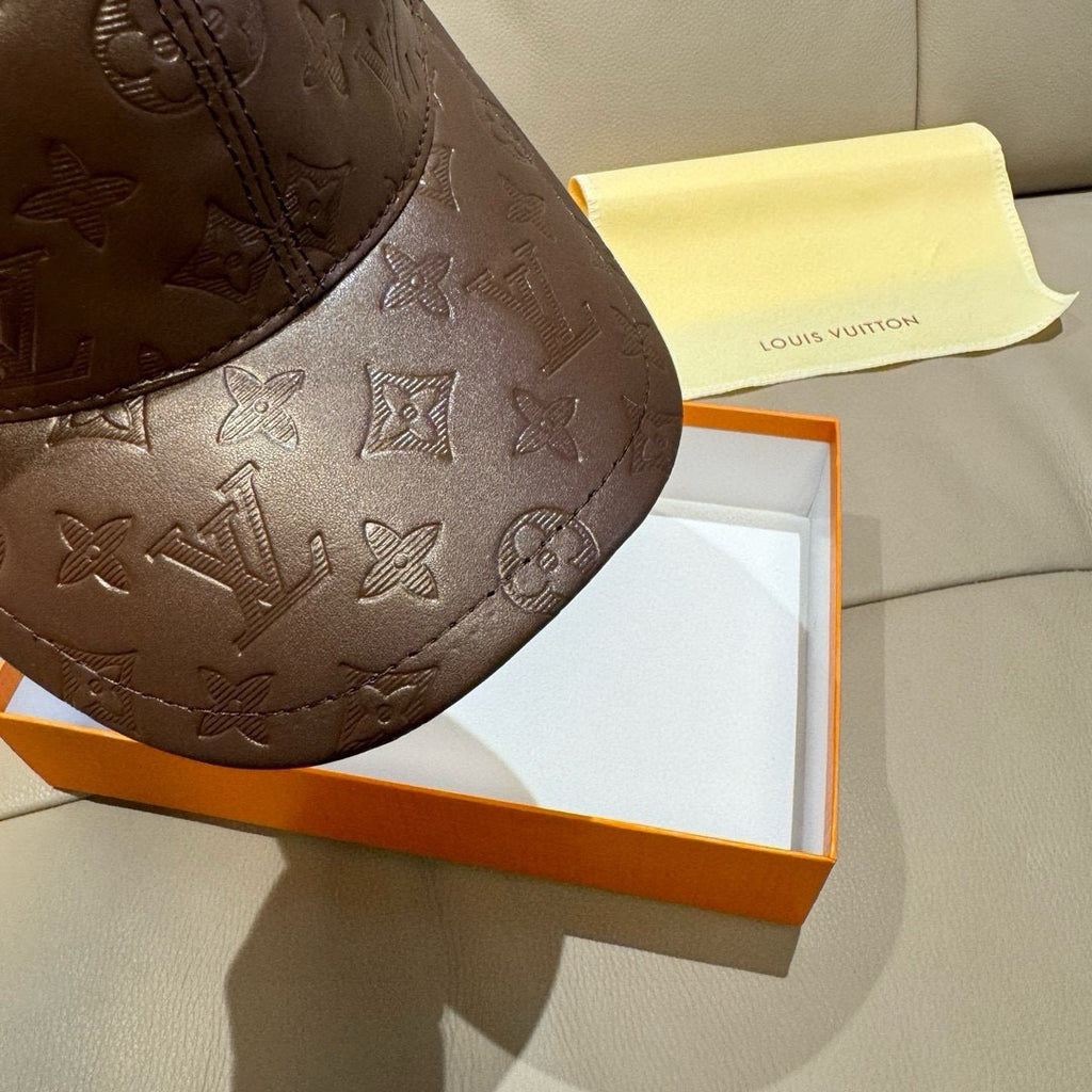 Louis Vuitton cap side view, dark brown monogram leather with curved brim pattern