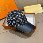 Louis Vuitton baseball cap three-quarter view, black monogram print and navy brim.