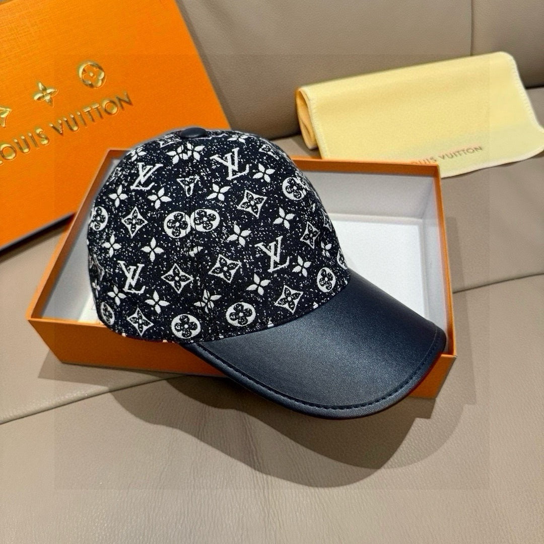 Louis Vuitton baseball cap three-quarter view, black monogram print and navy brim.