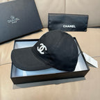 Black satin baseball cap with white CC logo on front and stitched crown