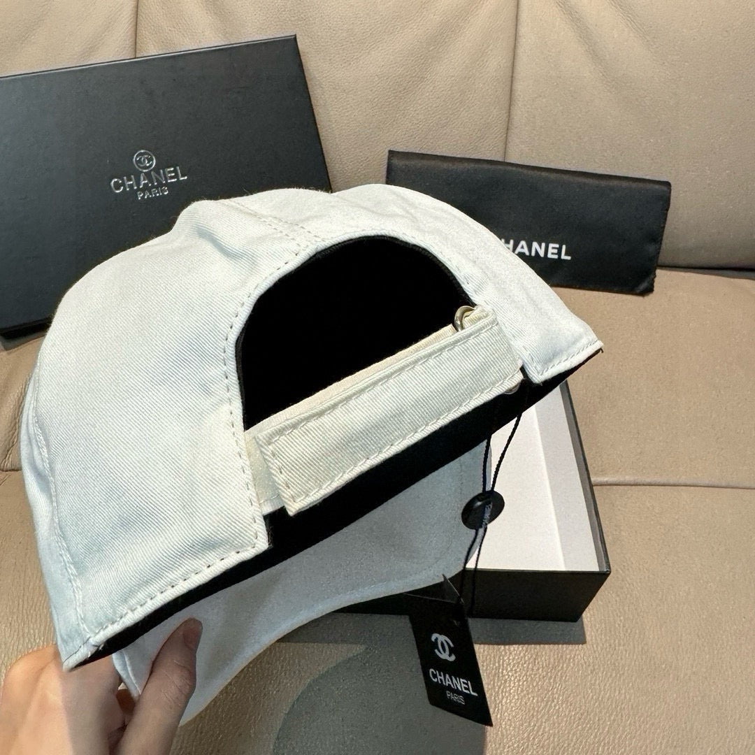Light blue baseball cap interior view with side strap and curved brim.