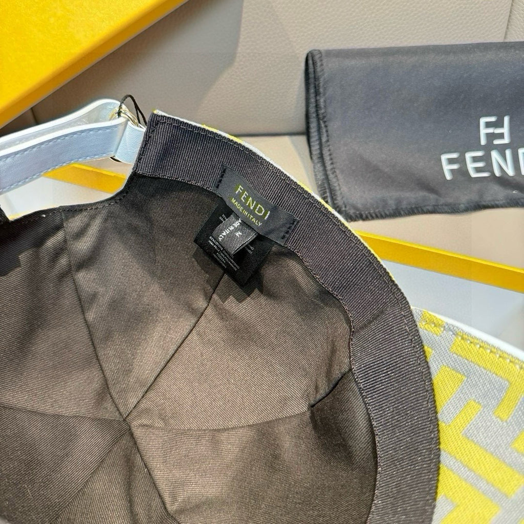 Fendi cap with black adjustable strap and Fendi label detail