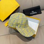 Fendi cap with light yellow and gray FF pattern, side view and curved brim
