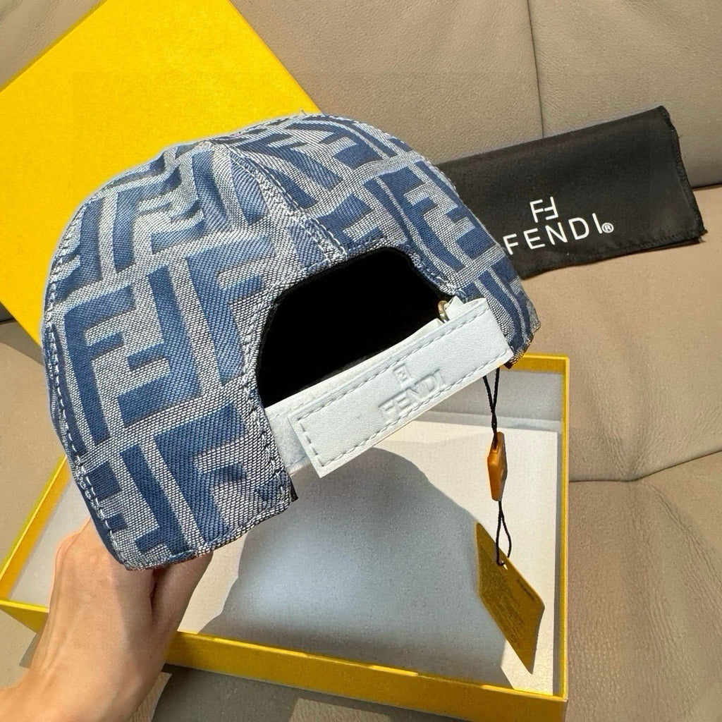 Blue Fendi FF baseball cap with white leather strap patch on side