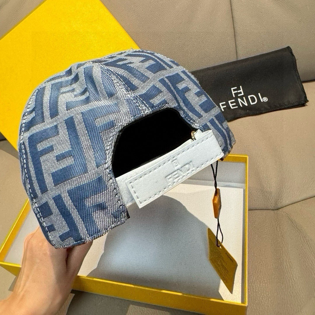Blue Fendi FF baseball cap with white leather strap patch on side