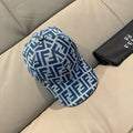 Fendi cap with blue FF monogram pattern and dark button on top