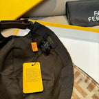 Fendi monogram cap interior with black strap, Fendi tags, and brown FF fabric