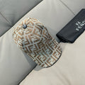 Fendi monogram cap in beige and brown FF pattern with dark button detail