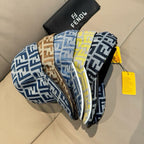 Fendi patterned caps stack in blue, black, yellow, and brown with curved brims