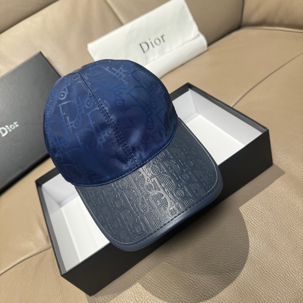 Blue Dior baseball cap with monogram pattern, curved brim and top button.