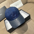 Blue Dior baseball cap with monogram pattern, curved brim and top button.