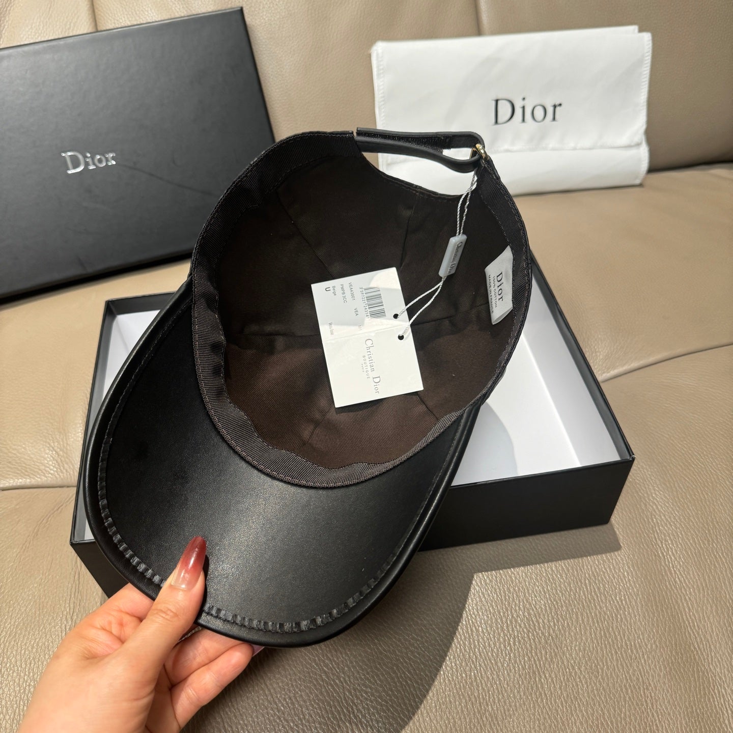 Dior monogram baseball cap, back view with adjustable strap and hang tags