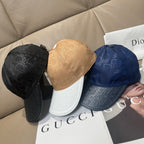 Dior cap set with tan, black, and blue caps stacked on boxes and tissue.