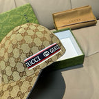 Gucci baseball cap featuring brown GG monogram canvas and a front logo band.