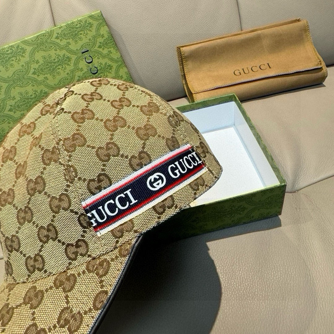 Gucci baseball cap featuring brown GG monogram canvas and a front logo band.
