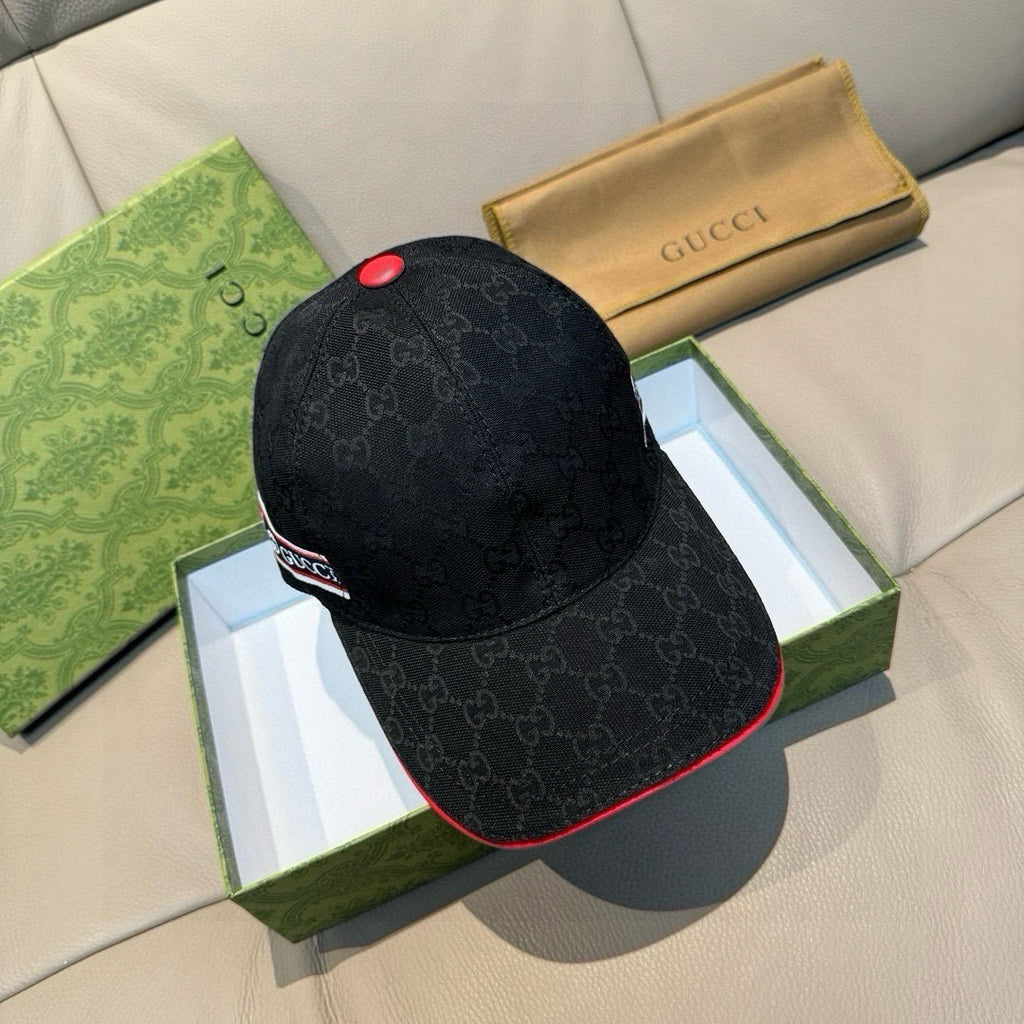 Black Gucci baseball cap with tonal GG monogram and red top button