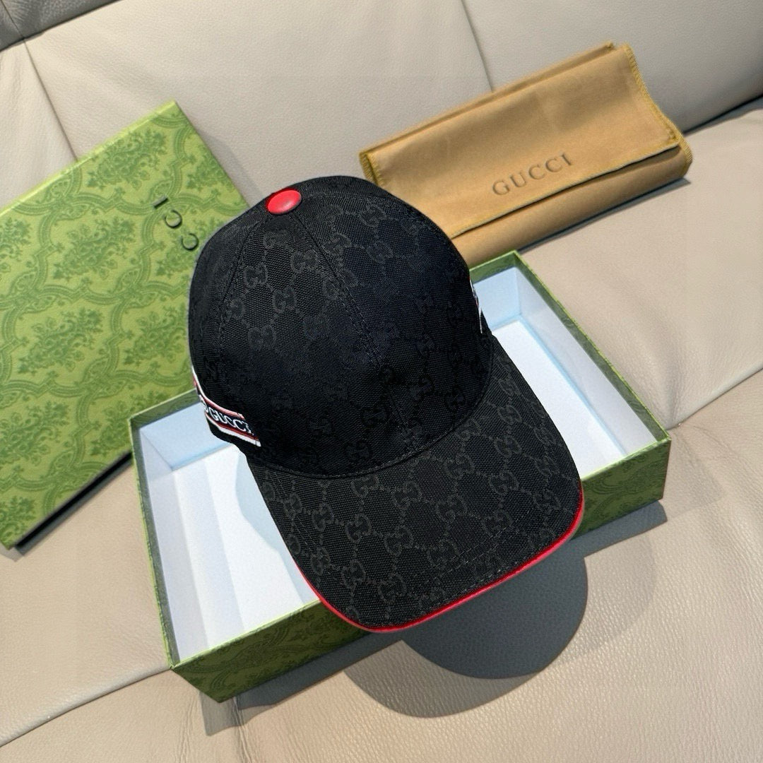 Black Gucci baseball cap with tonal GG monogram and red top button