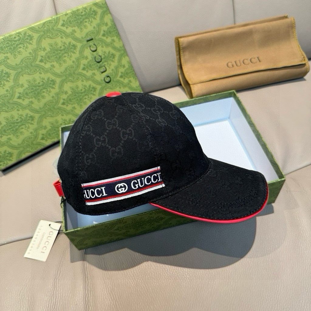 Black Gucci baseball cap with GG monogram print and red underbrim trim