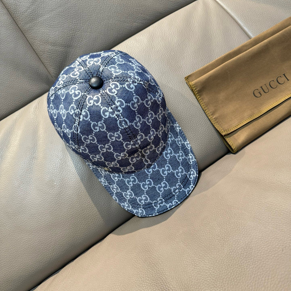 Gucci GG-print baseball cap in blue with dark trim and stitched pattern